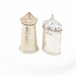 Group of silver cruet items, comprising pair of Art Deco salt and pepper shakers, of tapering cylindrical form, hallmarked Viner's Ltd, Sheffield 1933, pair of silver open salts, pair of salt shaker, and a matching pepper shaker and open salt, all hallmarked