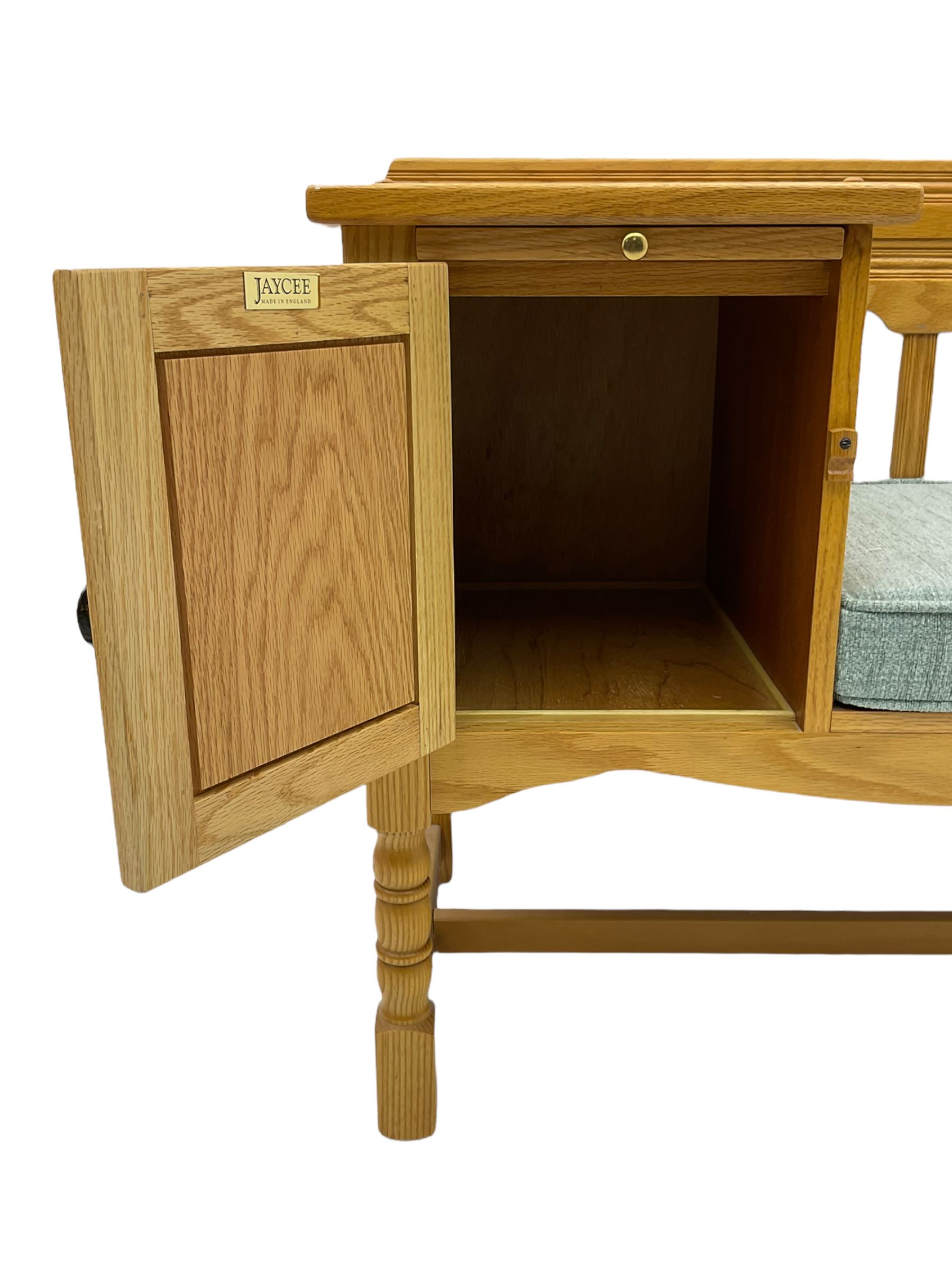 Light oak telephone table, with cupboard, upholstered seat