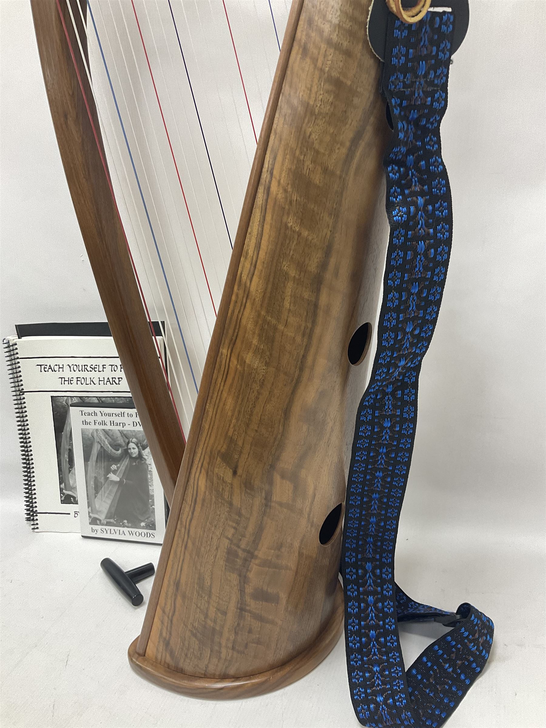 Contemporary 24 string Celtic or Irish Folk Harp with an Ash soundboard and 24 sharpening keys, with three music books, tutorial and DVD In a soft carrying case with tuning key 