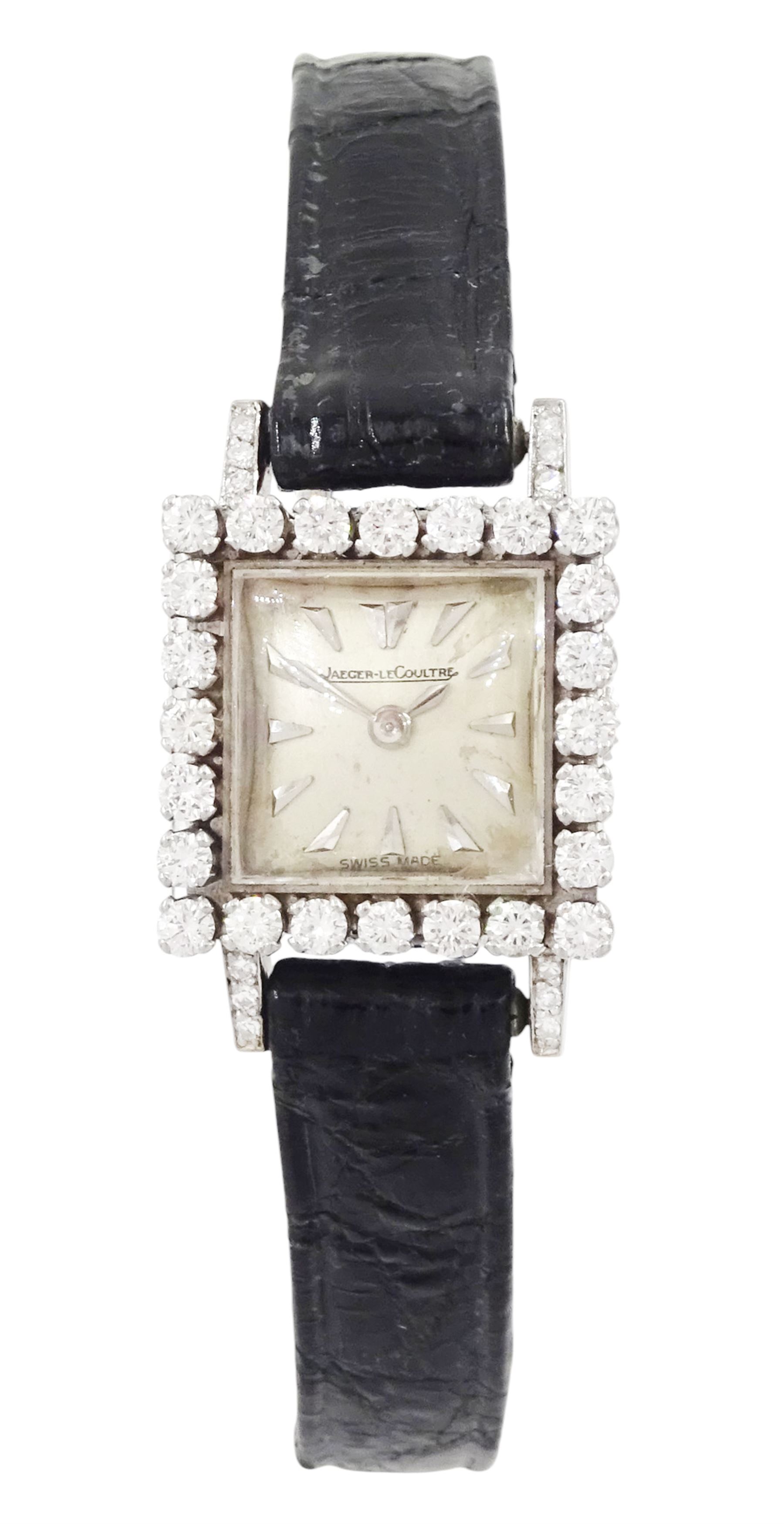 Jaeger-LeCoultre ladies 18ct white gold diamond manual wind wristwatch, back case No. 755841, square silvered dial with round brilliant cut diamond bezel and single cut diamond set lugs, crown wound from back case, on black leather strap, with 18ct white gold buckle, stamped 750, total diamond weight approx 0.70 carat