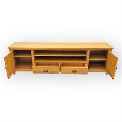 Cotswold & Co - large light oak media stand, rectangular top above central open shelf, double drawer flanked by two panelled cupboard doors, fitted with metal cup and knob handles