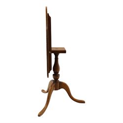 Traditional design golden oak tilt-top tripod table, brass fittings, turned baluster column on splayed supports