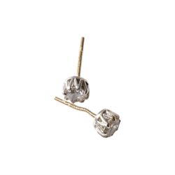 Pair of gold paste set stud earrings and and rope twist bracelet, both hallmarked 9ct