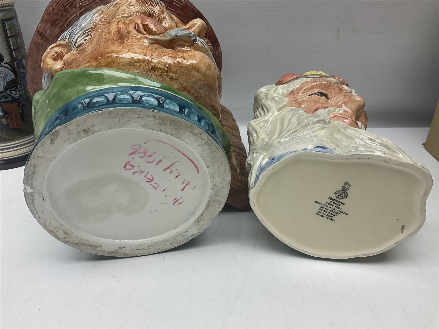 Collection of toby jugs and character jugs, to include Royal Doulton Winston Churchill and Neptune, together with Staffordshire Character Jugs examples  