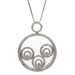  18ct white gold floating diamond pendant stamped 750, on silver snake chain necklace by Tejori gems  