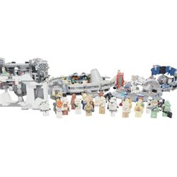 Collection of partially built Lego Star Wars models, including Motorized Walking AT-AT no. 10178, Hyena Droid Bomber no.8016, Emperor Palpatines Shuttle no. 8096, Jabbas Palace no. 4480 and Millennium Falcon no. 4504, etc together with a quantity of Lego Star Wars minifigures, loose parts and instruction booklets for Lego Star Wars sets