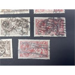 Great Britain King George V seahorse stamps, comprising fourteen half crown, seven five shillings and two ten shillings, all used, all previously mounted