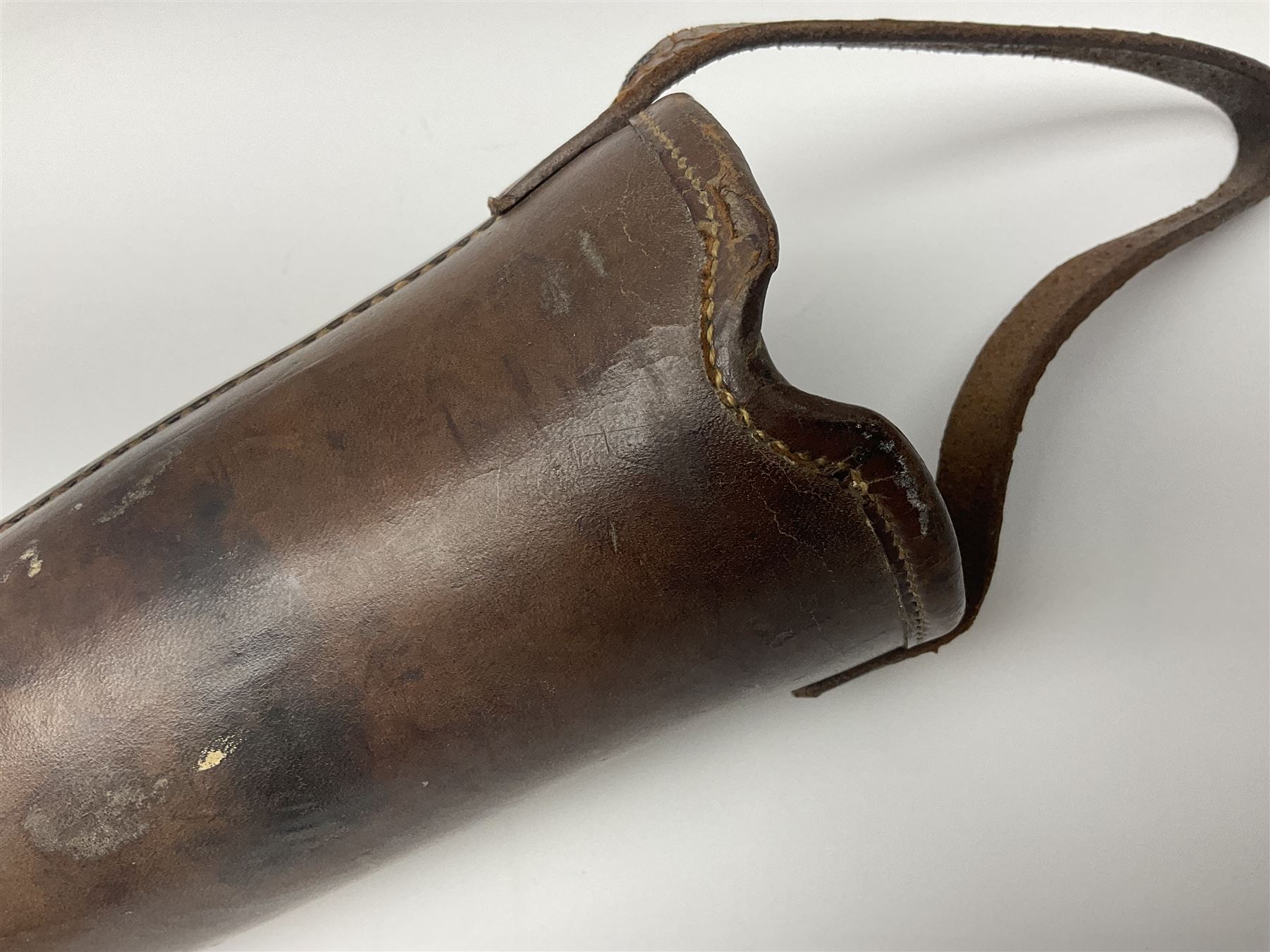 19th century telescopic hunting horn, the bell engraved 'The Beaufort', with makers mark Kohler & Son, makers, 61 Victoria Street, Westminster (from Covent garden) London, in a leather sheath, horn full extended L91cm 