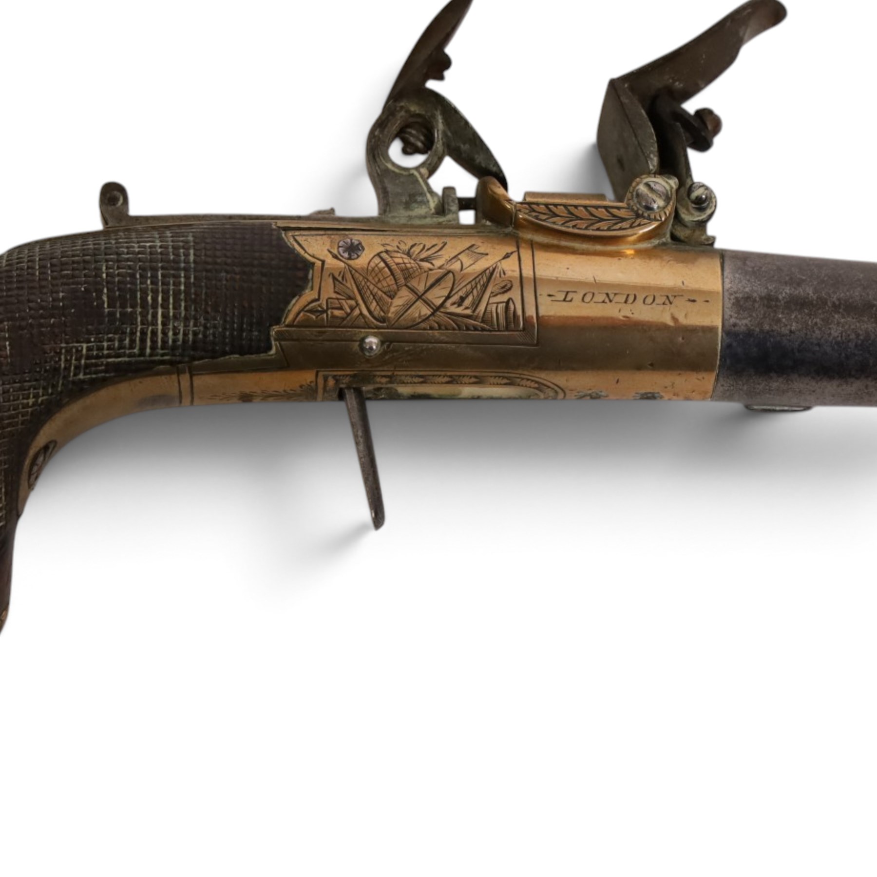 Pair early 19th century flintlock pocket pistols by Twigg of London, with 4cm twist-off barrel, concealed trigger, engraved and named action, chequered stock with vacant wrist cartouche and lion mask butt cap, overall L15cm 