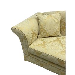 Three-seat hardwood framed sofa, traditional shape with arched cresting rail over rolled arms, upholstered in pale gold and cream damask fabric with repeating foliate pattern