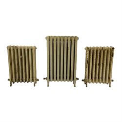 Three cast iron radiators, 50x76cm and 44x62cm