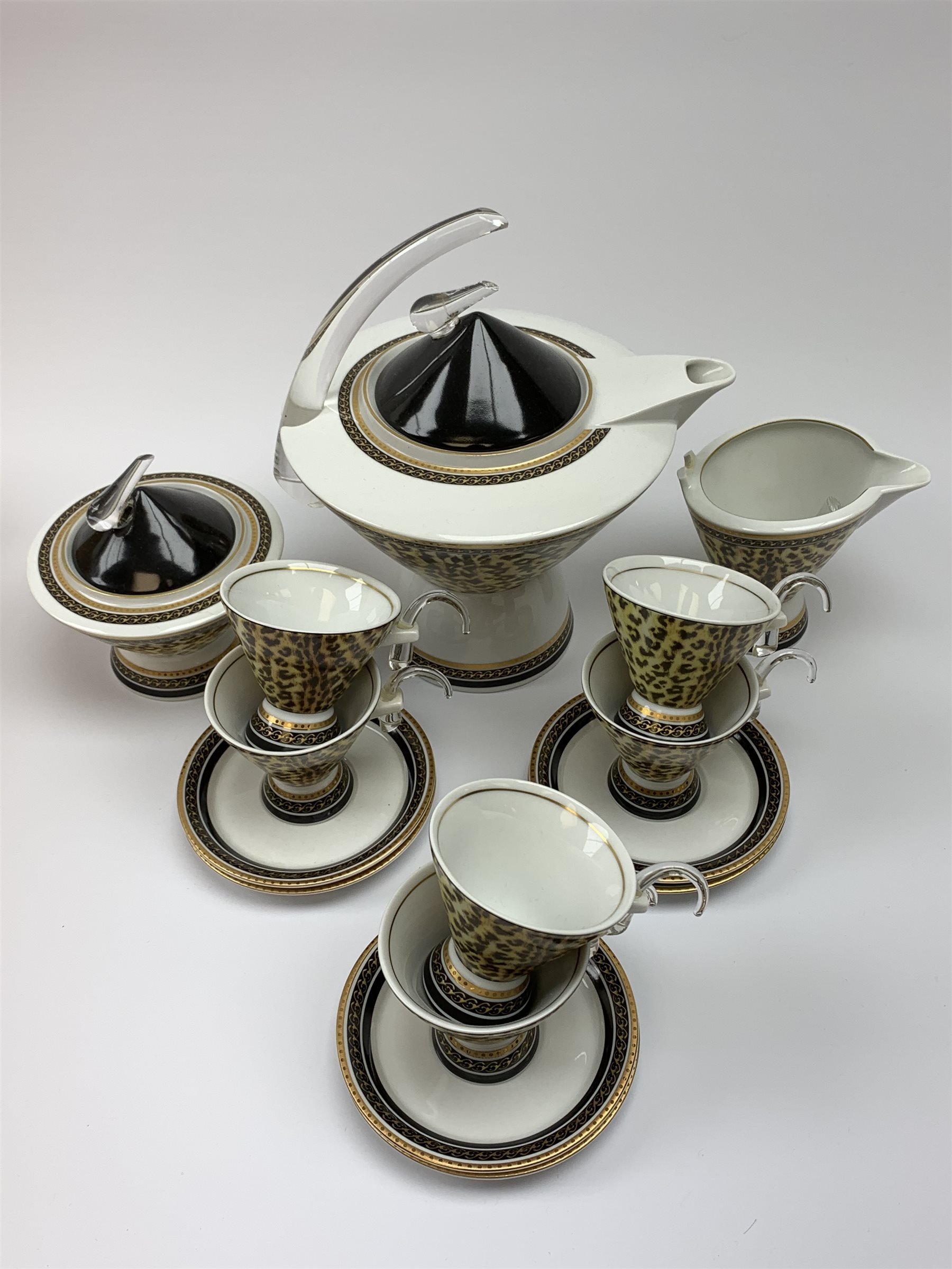 A Chech Republic Thun Studio Leopard print tea set, comprising teapot, milk jug, sucrier and cover, and six tea cups and six saucers. 