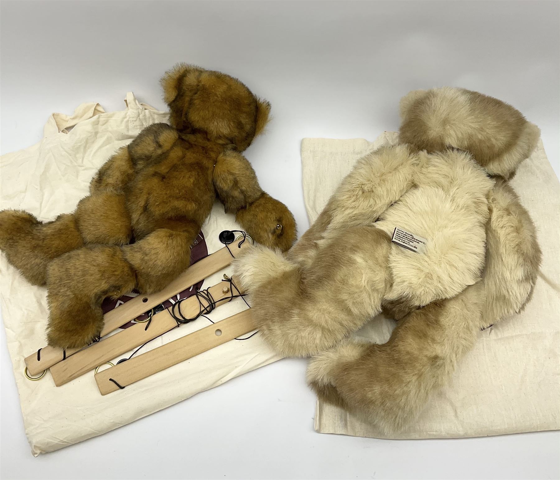 Two Charlie Bears teddy bears - limited edition 'Jonty' puppet No.4/600 designed by Heather Lyell H41cm, with sticks, certificate and tag; and 'Angus' designed by Maria Collins H41cm, with tags; each in white carry bag (2)