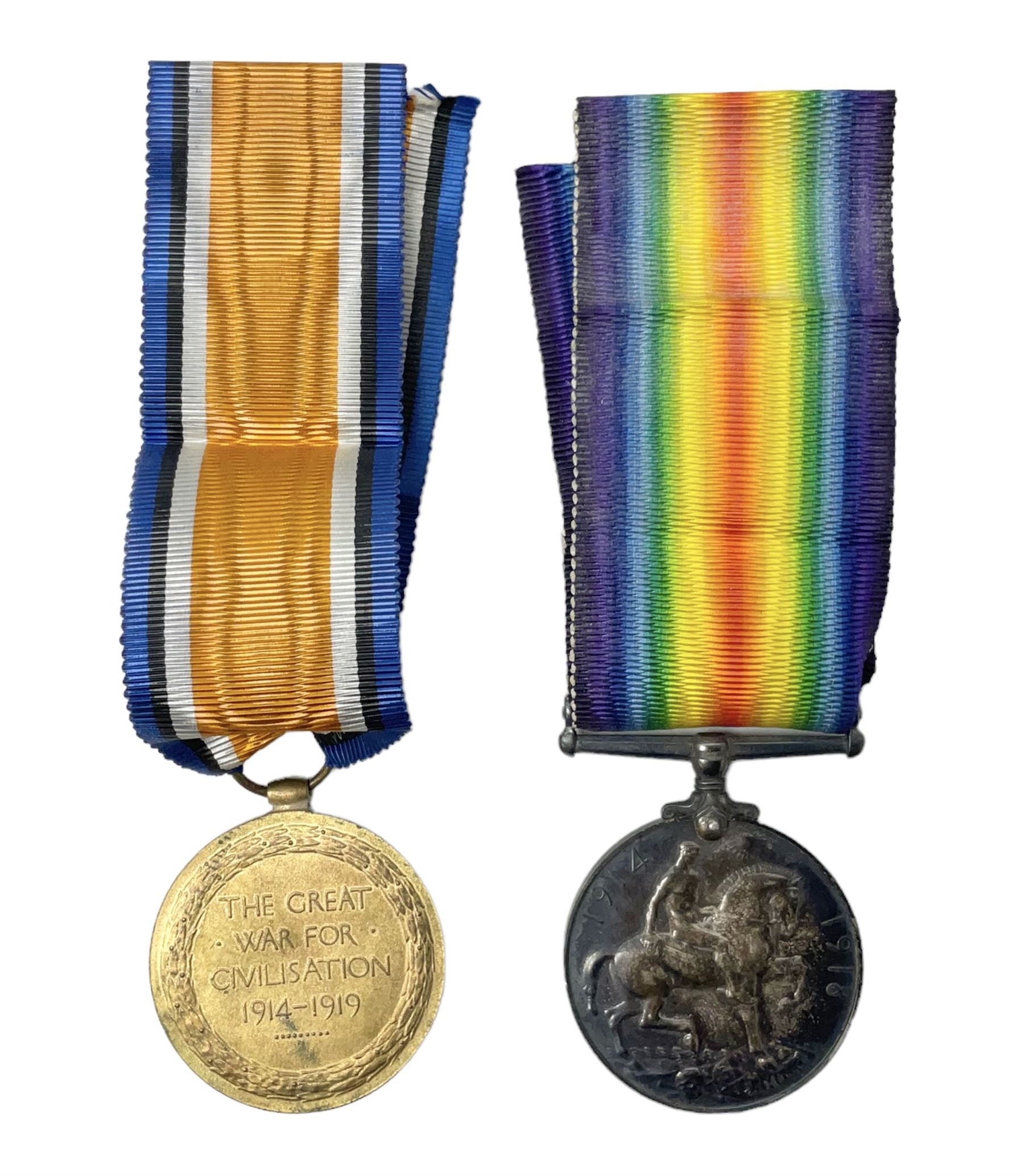 Pair of WWI medals, comprising British War medal and Victory medal, both with ribbons