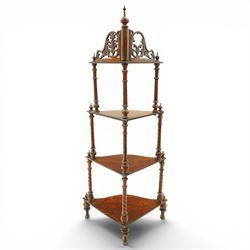 Victorian mahogany corner four-tier whatnot, shaped shelves with pierced and turned uprights, raised on turned supports