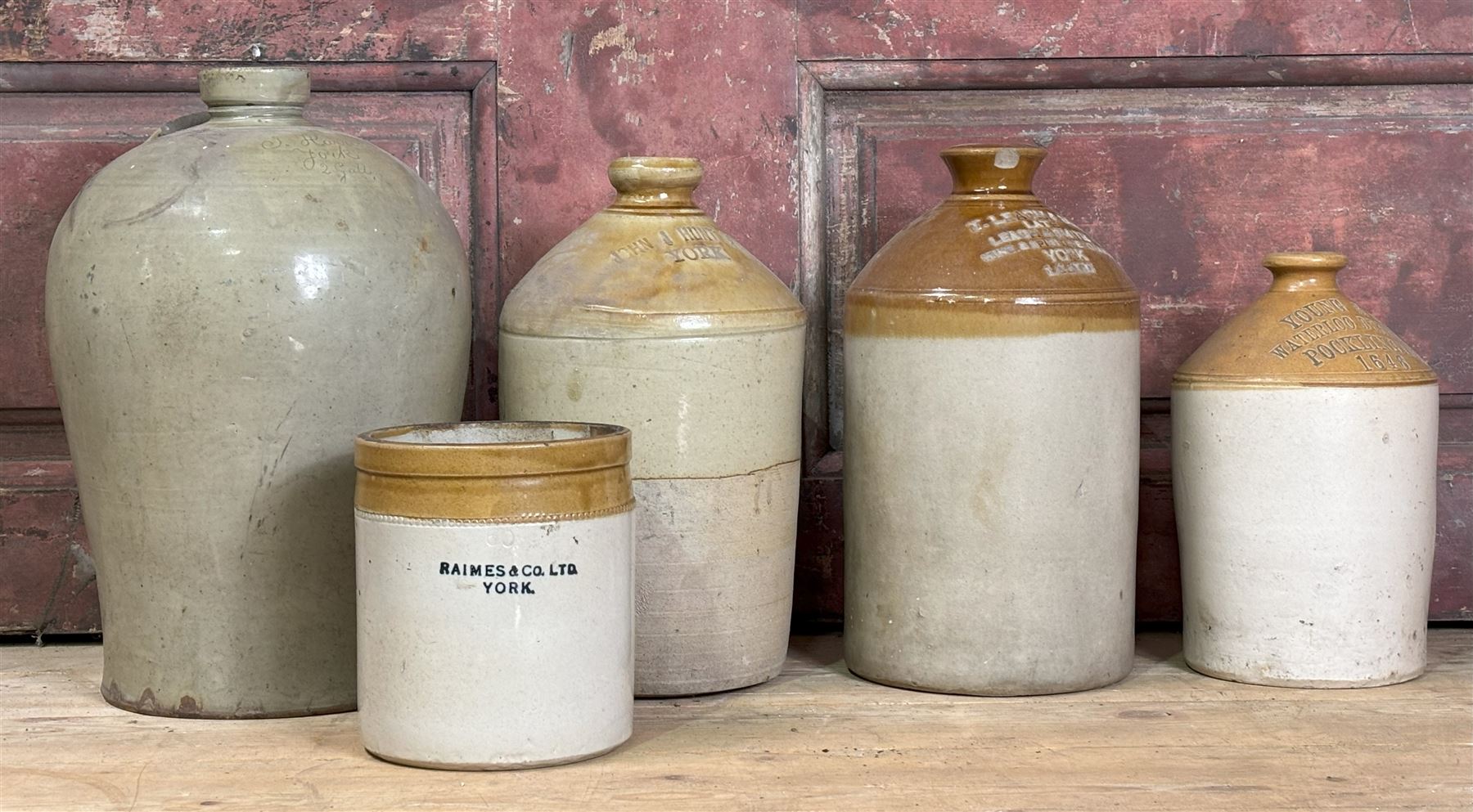 Group of four 19th century stoneware flagons of local interest, York, Pocklington etc, and a stoneware jar. (5)  - COLLECTION BY APPOINTMENT FROM: The White House, Thirsk Road, Easingwold, York, YO61 3NF - CALL 01723 507111 TO ARRANGE