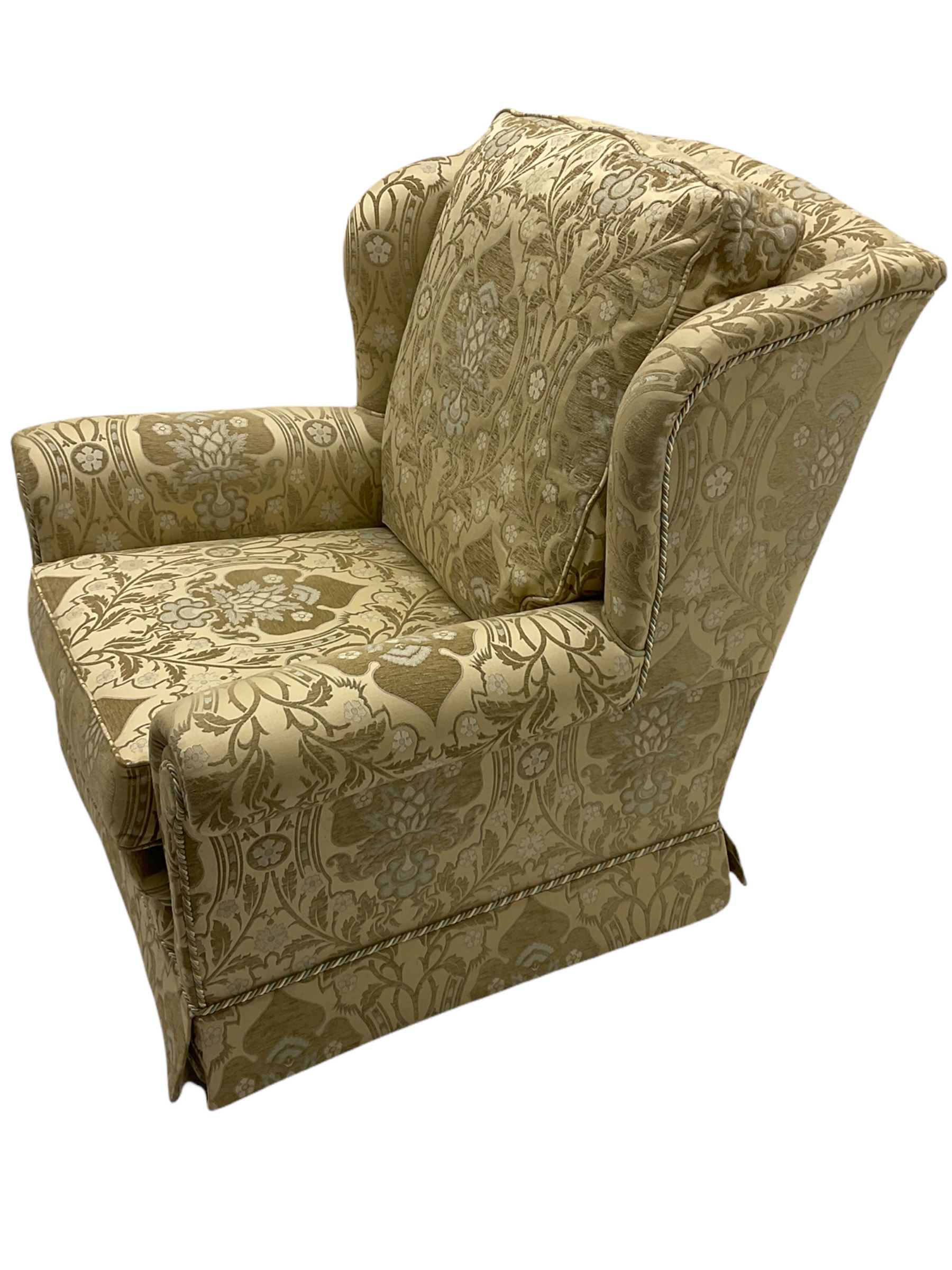 Steed Kedleston three seat sofa, and matching wing back armchair, upholstered in pale gold fabric