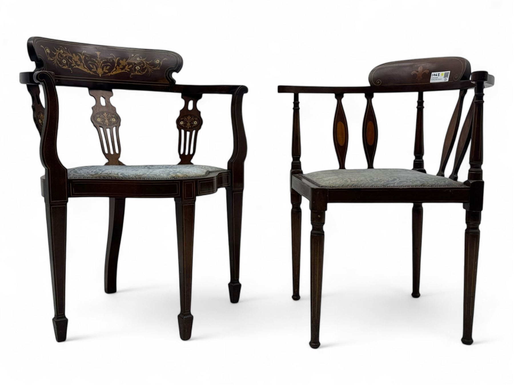 Edwardian inlaid mahogany corner chair, curved arms on shaped splat supports inlaid with satinwood, on turned supports (W60cm, H75cm); Edwardian inlaid mahogany tub-shaped armchair, the cresting rail inlaid with scrolling acanthus leaves and flower heads, on square tapering supports with spade feet (W58cm, H80cm)