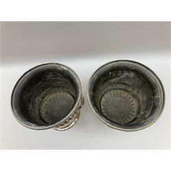 Pair of silver plated wine coolers, of campagna form, the bodies of part fluted form with twin fruiting vine modelled handles, upon spreading circular feet, H21cm rim D21cm