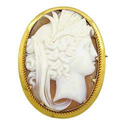 Gold cameo brooch of a classical ladies head, stampe 9ct