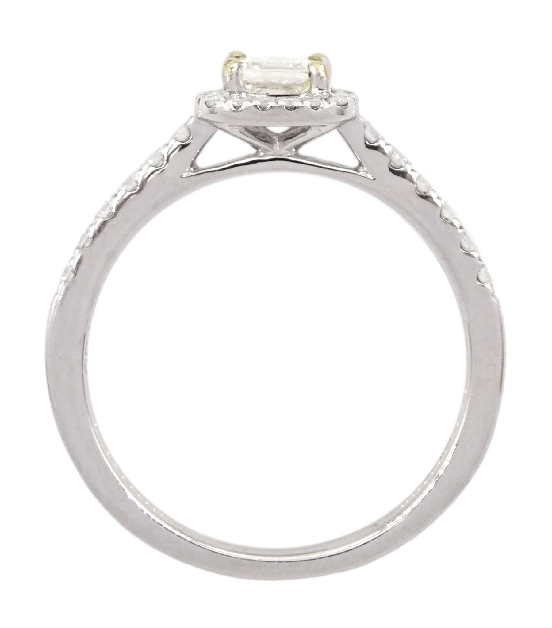 18ct white gold diamond halo cluster ring, the principal asscher cut diamond of 0.39 carat, with round brilliant cut diamond surround and diamond set shoulders, hallmarked, with International Gemological Laboratories report