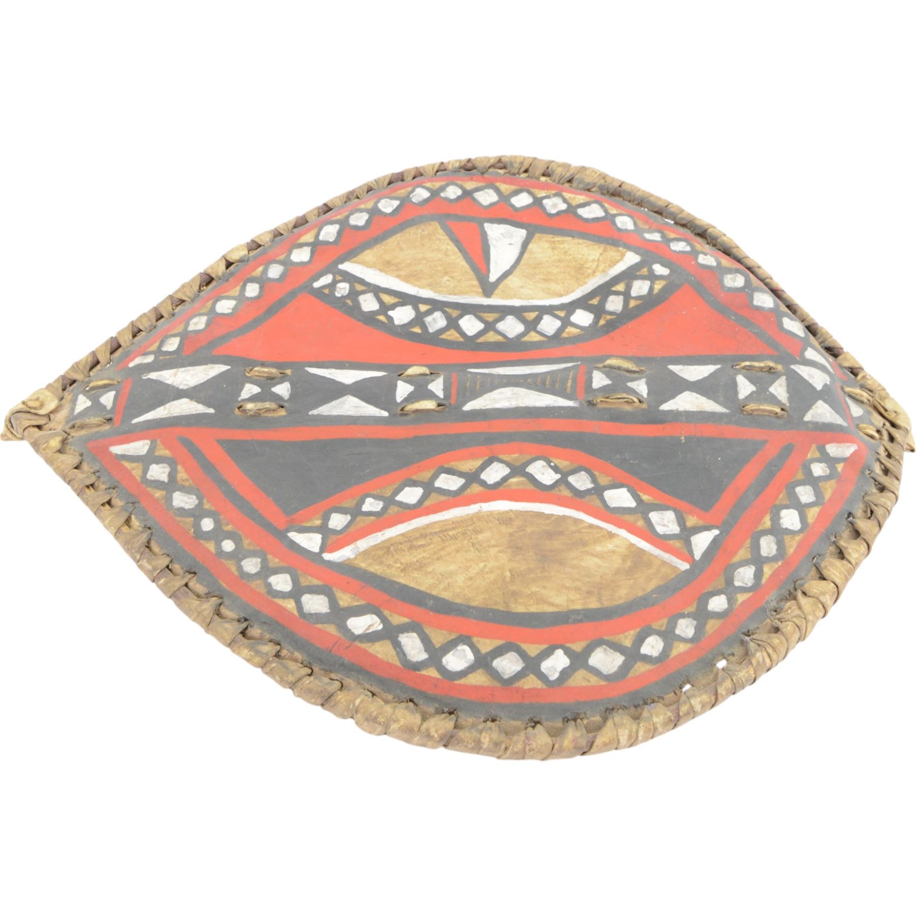 Maasai shield, made of hide, with white, red and black pigment decoration, the back attached to a wooden frame with hide stitching, together with two Maasai spears, shield H70cm, spears L120cm