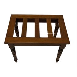 Late Victorian walnut luggage stand, on turned supports
