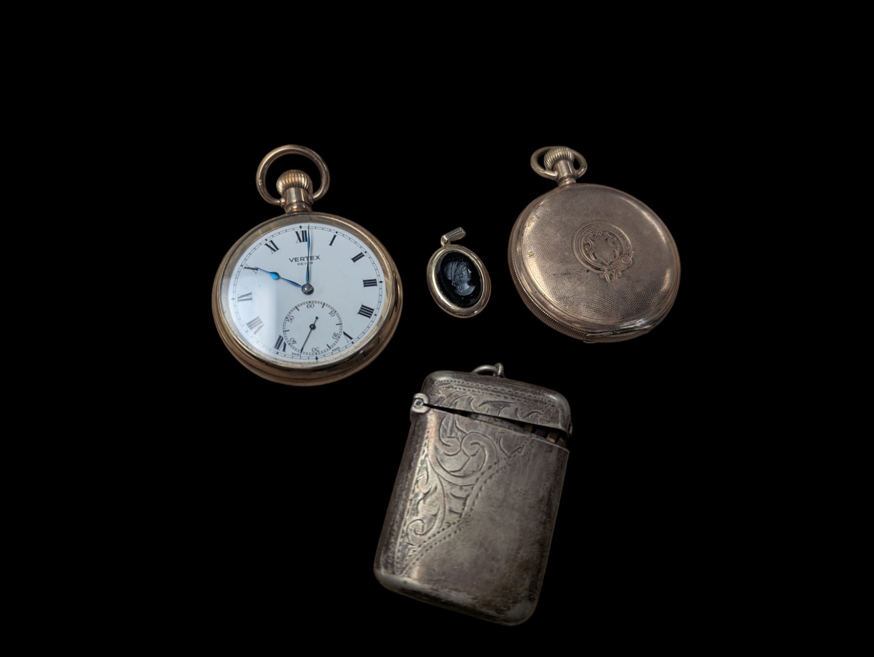 Two gold plated pocket watches, including open faced Vertex example, together with a silver plated vesta case and a Sarah Coventry pendant