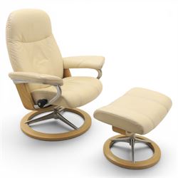 Ekornes - Stressless reclining beige leather armchair and stool, raised on brushed steel f...