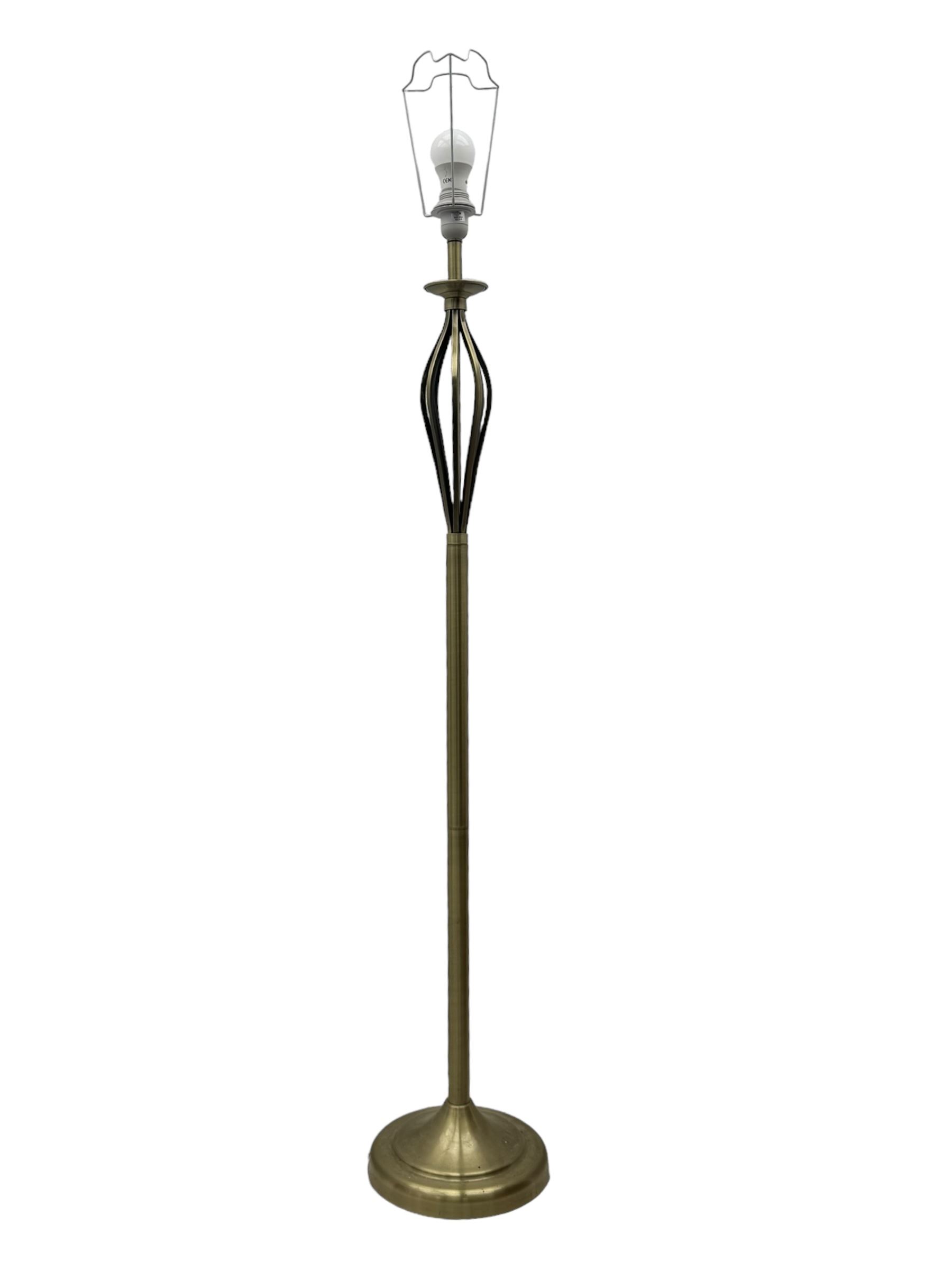 Contemporary brushed metal standard lamp, brass effect with cylindrical stem, on circular base, H131cm; matching table lamp, H35cm (2)