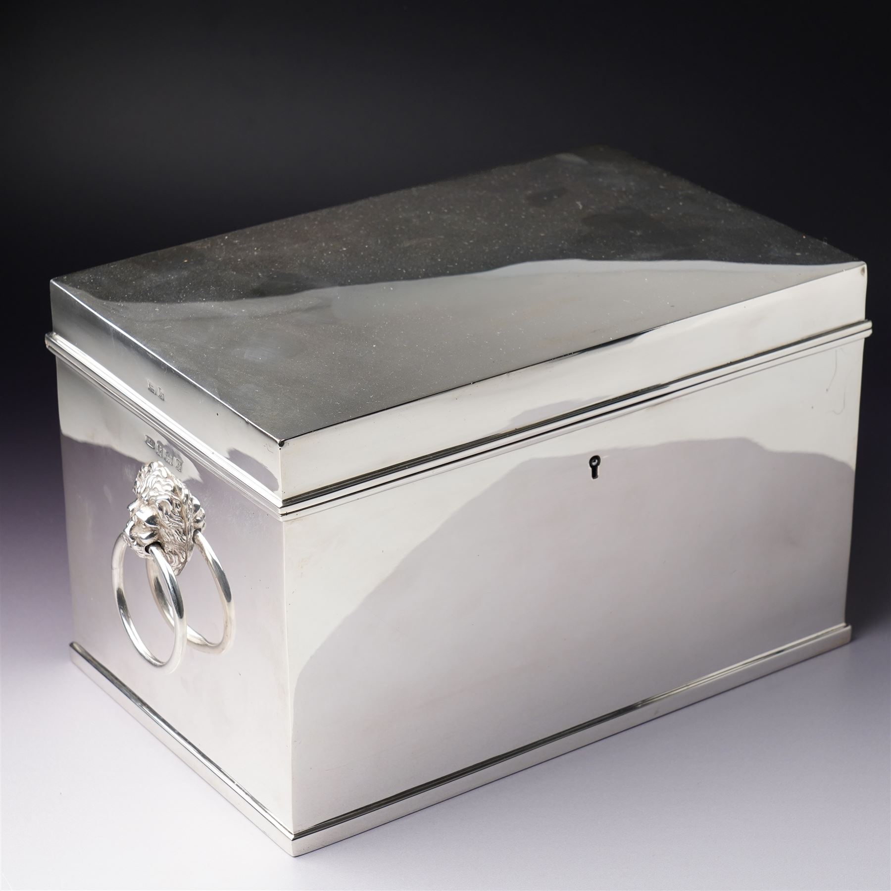 Edwardian silver rectangular cigar box with lion mask ring handles and wooden lined interior 24cm x 15cm x 15cm Birmingham 1909 Maker Horton & Allday 