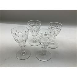 Pair of square sided cut glass decanters and stoppers, together with another cut glass example, twelve liquor glasses, and a Continental coffee can and saucer, transfer print decorated, in one box 
