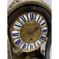 18th/19thcentury French Rococo Boulle bracket clock in the Louis XIV style, shaped case with putto pediment over a glazed door, detailed circular gilt dial set with 12 enamel cartouche panels with blue Roman numerals, case decorated with finely cut inlaid pierced brass work representing scrolled foliage and blossoms with foliate scrolling mounts, single train 8-day movement with a recoil anchor escapement striking on three bells with pull repeat, shaped movement plates with four tapering conical pillars, inscribed 'Brodon A Paris'