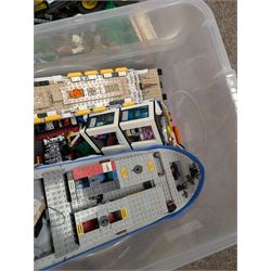 Two boxes of partially built Lego vehicles, including Lego Technics Dumper Truck no. 8264, Titanic, container ships, police boat, smaller police vehicles, etc