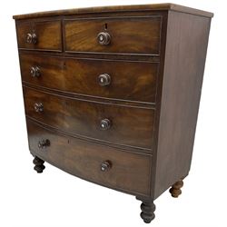Victorian mahogany bow-front chest, two short over three long cock-beaded drawers with turned handles, on turned feet