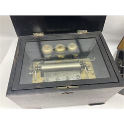 Swiss - 19th-century cylinder music box with three butterfly bells in sight, in a mahogany case with two separately boxed  6” cylinders, glazed viewing lid, 41 tooth comb (one tooth broken) crank key missing, movement untested.