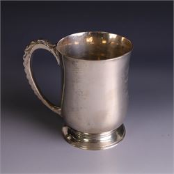 1930s silver tankard, of typical bellied form upon a circular base with ribbed handle, the body with presentation engraving, hallmarked Mappin & Webb Ltd, Sheffield 1937, H12cm