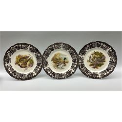Royal Worcester Palissy Game Series pattern dinner wares, comprising seven dinner plates, six side plates, twelve bowls, sauce boat and stand, six tea cups, eight saucers, further larger saucer, milk jug, and open sucrier. 