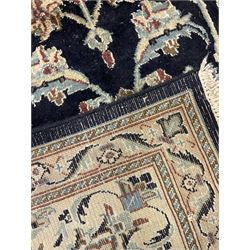 Central Persian part silk indigo ground Nain carpet, the field decorated with interlacing leafy branches and stylised plant motifs, scrolling design border within guard stripes 