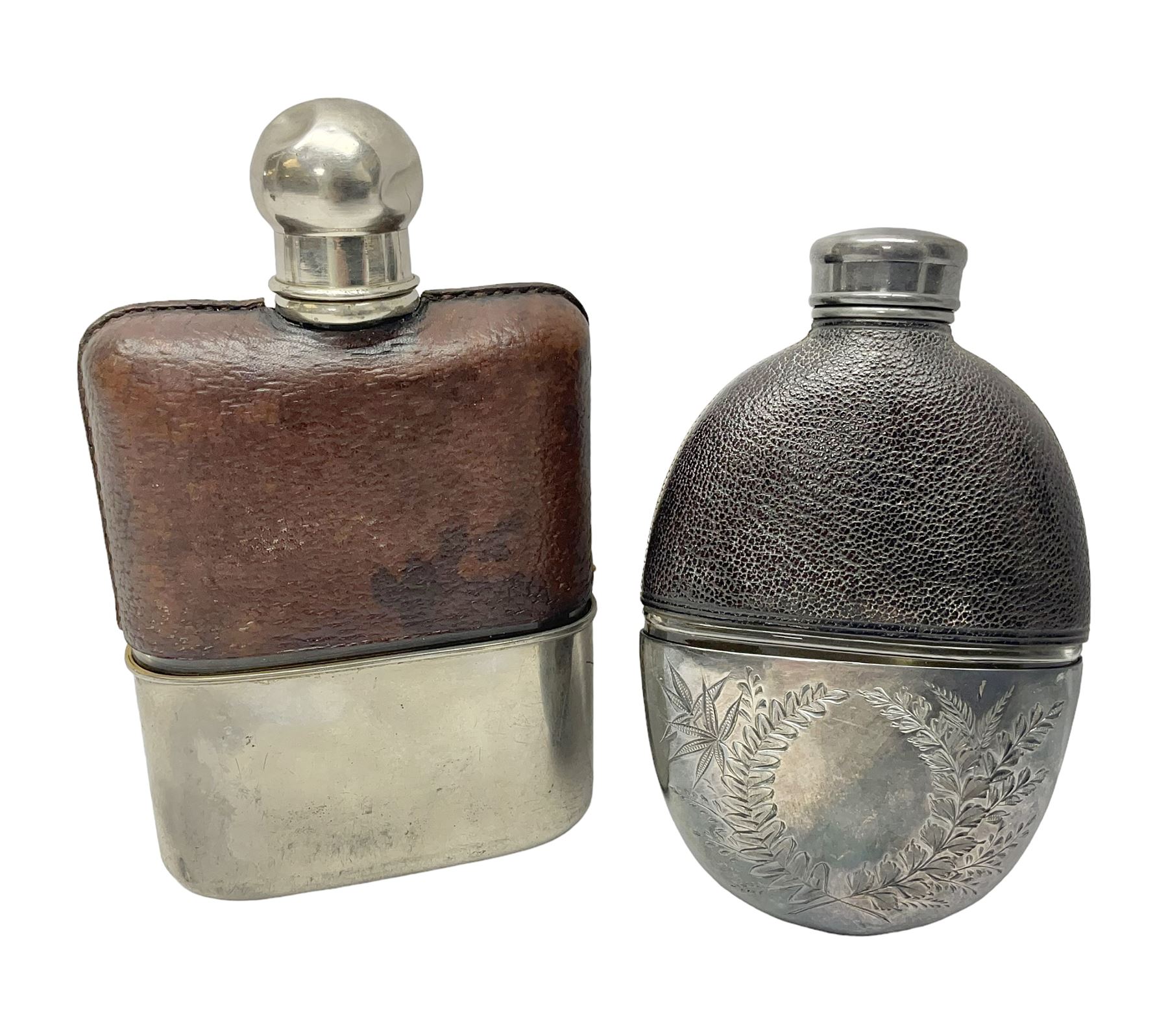Silver plated glass and pressed leather hip flask, with swivel cap and removable cup, together with a similar oval example, engraved with wreath and initial B, tallest H16.5cm