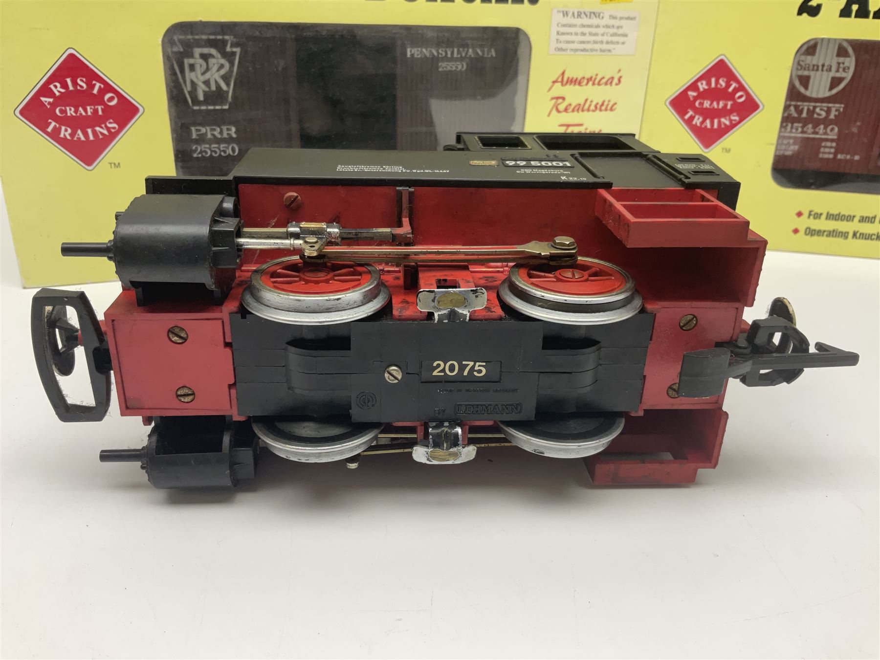 LGB (Lehmann Gross Bahn) G scale, gauge 1 - 0-4-0 tank locomotive No.995001; unboxed; and two American Aristo Craft Trains 2-axle boxcars Santa Fe and Pennsylvania; both boxed (3)