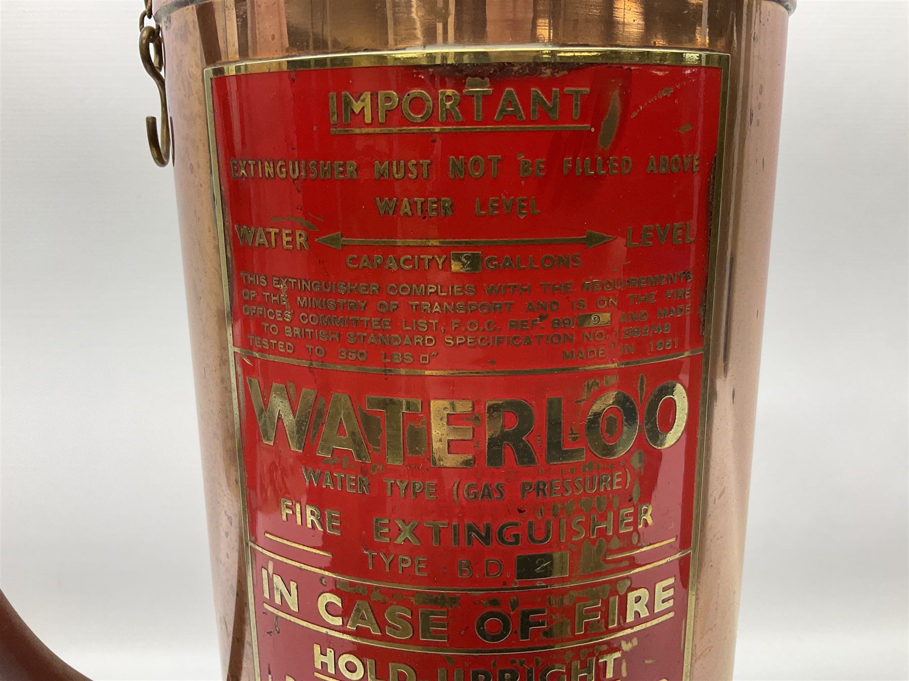 Large copper ‘Waterloo’ fire extinguisher by Read and Campbell Ltd and another Safex example 
