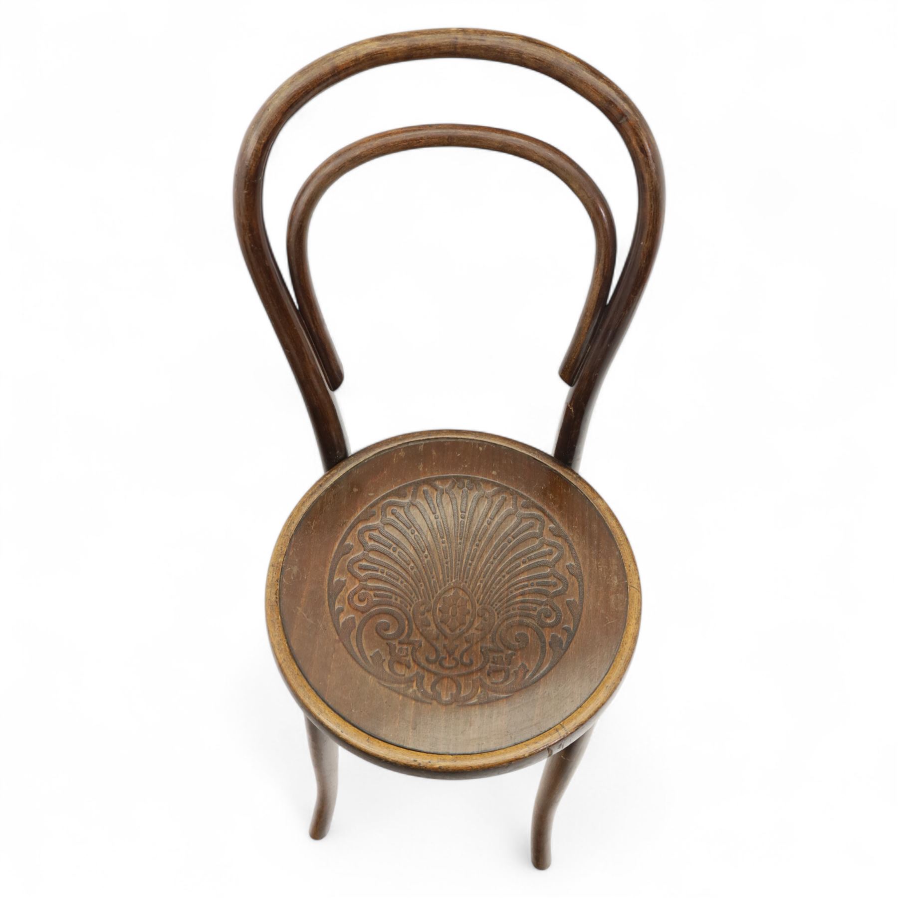 Set of three bentwood café chairs in the manner of Thonet, including a pair of side chairs (W 37cm, D 45cm, H 86cm) and a matching armchair (W 70cm, D 46cm, H 81cm), each with pressed seat decoration and continuous loop backrest