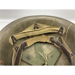 French Algerian War Red Cross steel helmet, marked 'CP ICA Esperaza 1955'; green finish with crudely painted Red Cross logo to the front