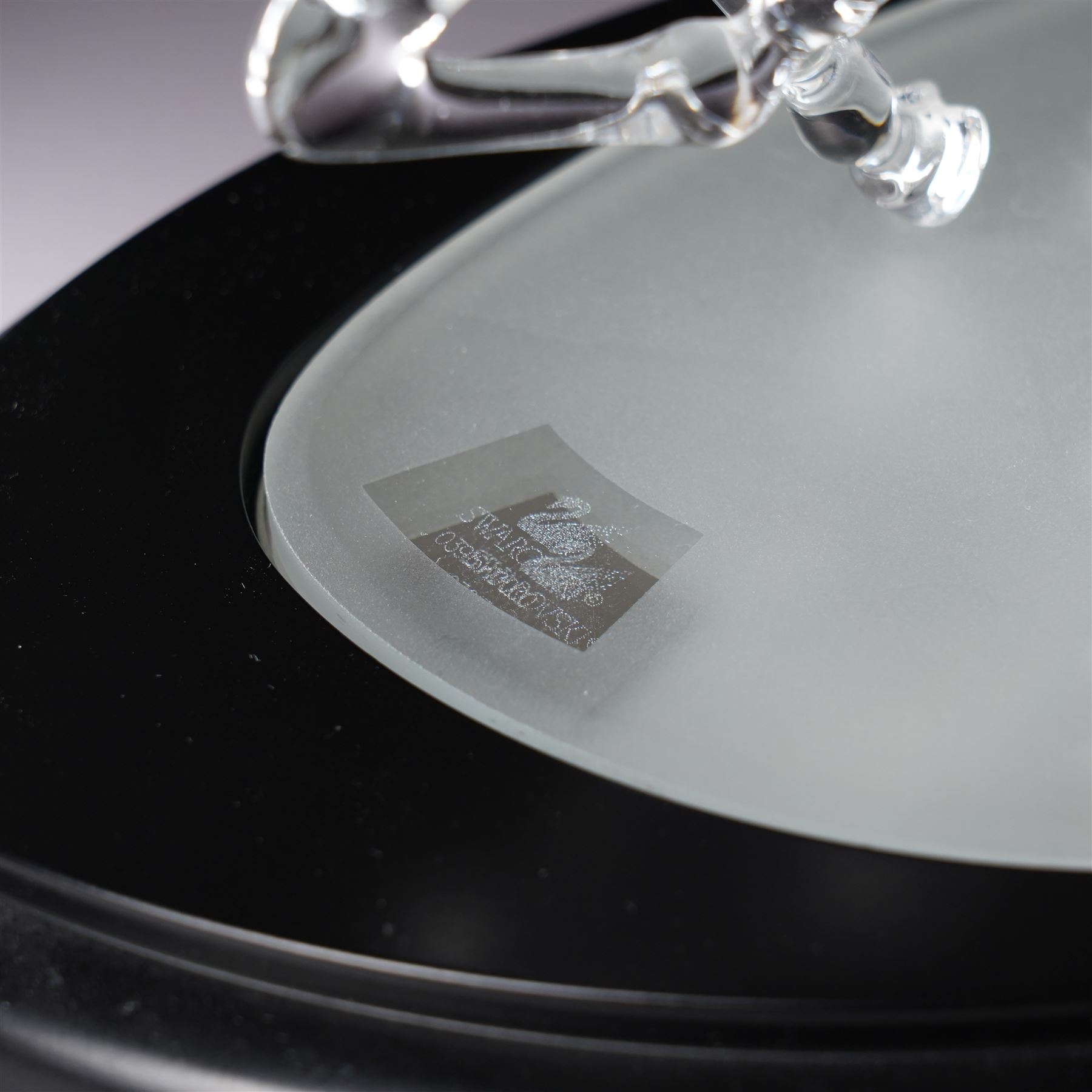 Swarovski, Wild Horses, modelled as two galloping horses upon a wooden plinth, limited edition 3915/10000, with certificate and case, H20cm