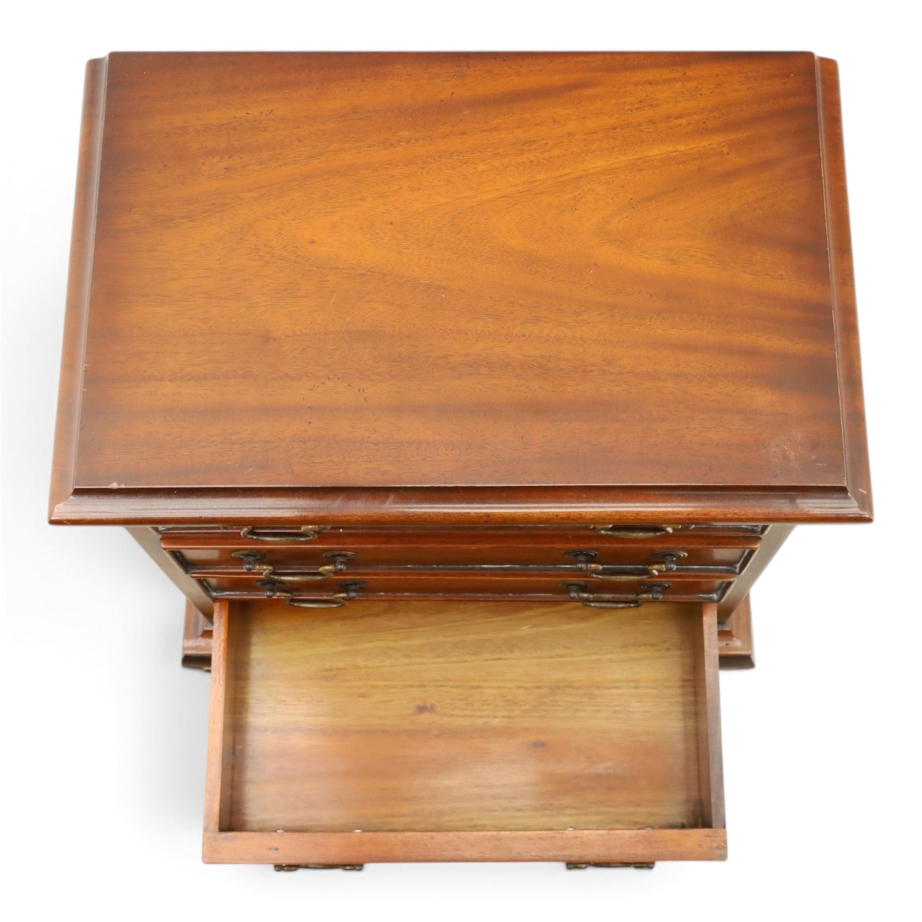 Georgian design mahogany dwarf chest, fitted with four long cock-beaded drawers, on ogee bracket feet