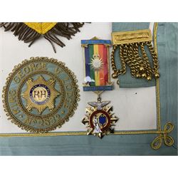Masonic regalia including jewels, apron etc housed in two cases