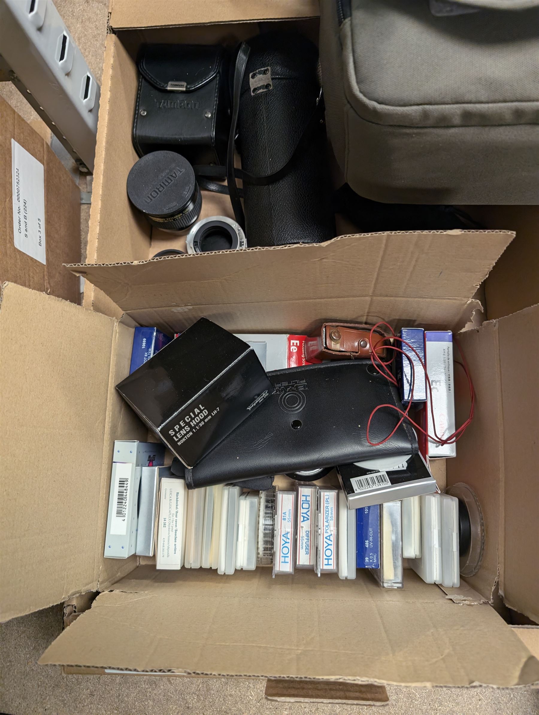 Camera equipment and accessories, including a boxed Manfrotto 290 dual tripods, two other tripods, four Tamron lenses and a collection of filters