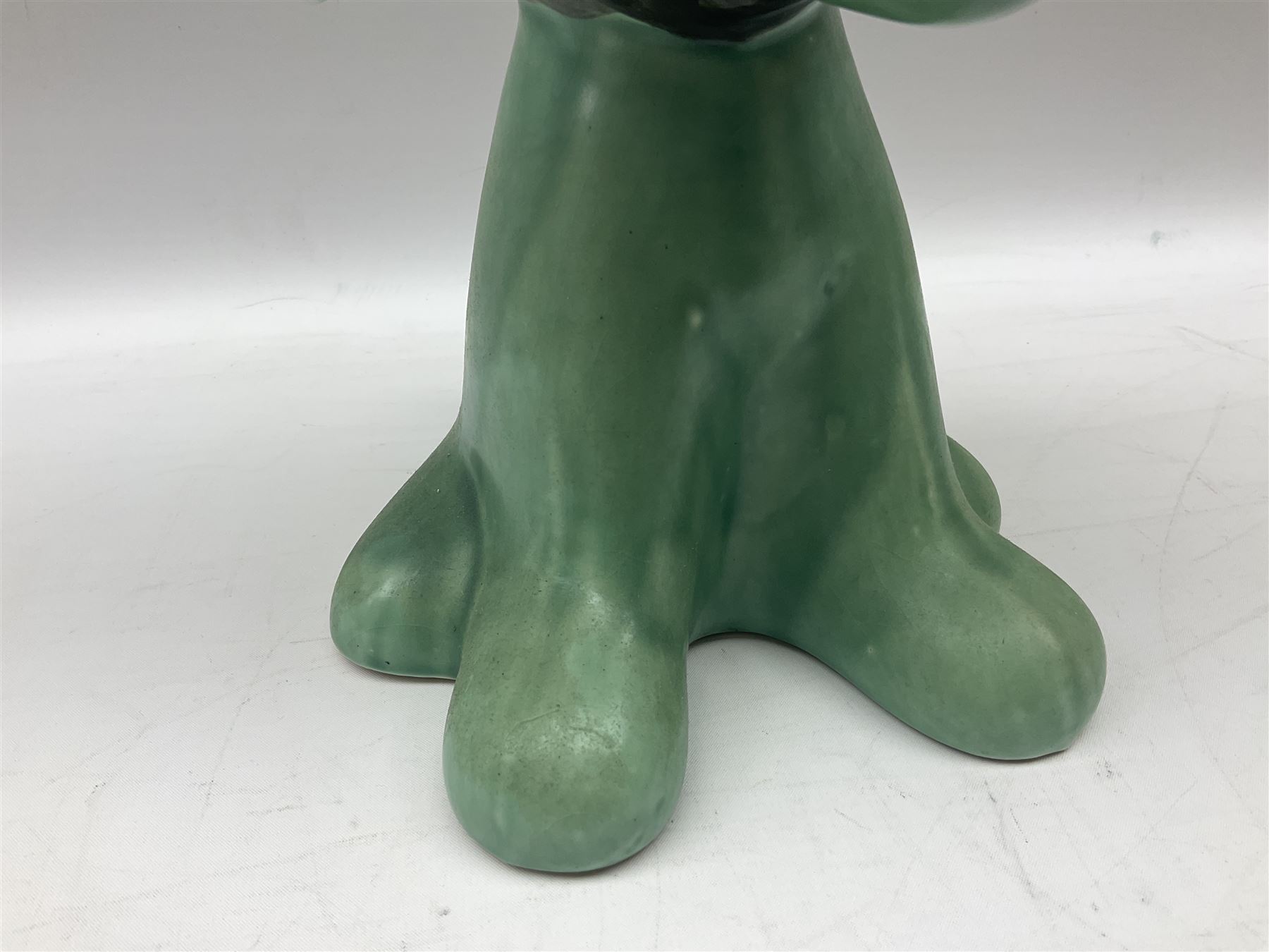 Sylvac 'toothache' dog in the green colourway, no 2451, with impressed beneath, H28.5cm