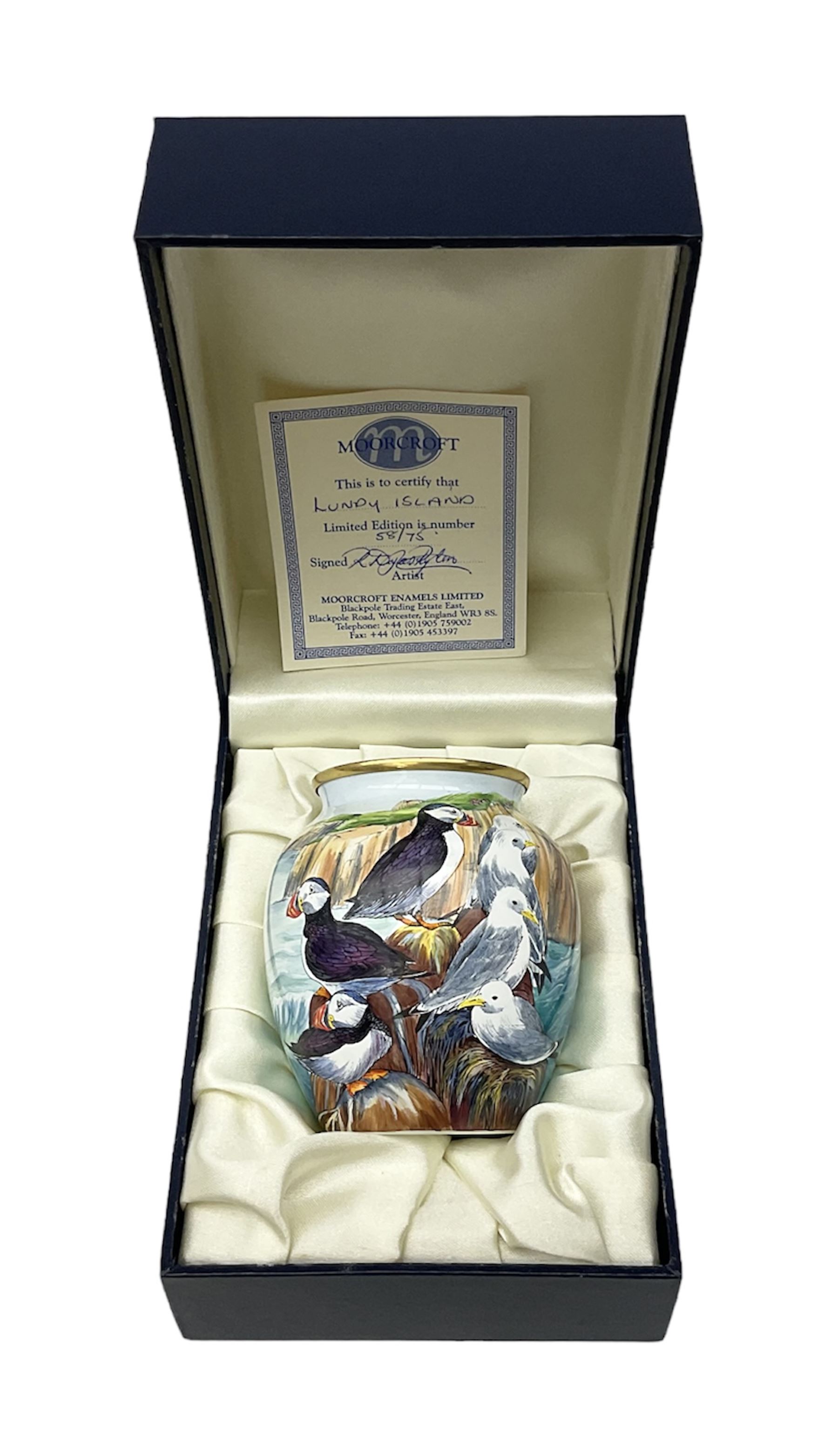 Limited edition Moorcroft enamel vase, decorated in the Lundy Island pattern, with certificate signed by the artists, no 58/75, in fitted box